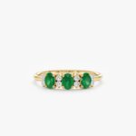 Diamond and Oval Emerald Ring