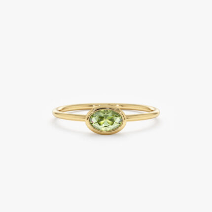 Oval Peridot Ring In Solid Gold