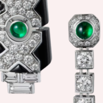 Pre-Owned Cartier Panthère de Cartier Sur Naturel Pavé Pendant Earrings in 18K White Gold with Diamonds, Emeralds, and Onyx