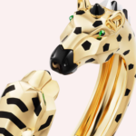 Pre-Owned Cartier Les Indomptables Panther & Zebra Bracelet in 18K Yellow Gold with Tsavorite Garnet, Moonstone, Onyx, and Black Lacquer - Image 4