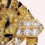 Pre-Owned Cartier Faune et Flore Pavé Brooch in 18K Yellow Gold with Yellow, Orange, and Brown Diamonds, Emeralds, and Onyx