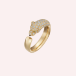 Pre-Owned Panthère de Cartier small model ring in 18K yellow gold, half-pavé set with diamonds and emerald eyes. An iconic luxury jewel.