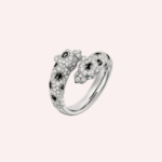 Pre-Owned Panthère de Cartier semi-pavé ring in 18K white gold set with diamonds, emerald eyes, and onyx. A timeless luxury jewelry icon.