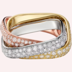 A Pre-Owned Cartier Trinity ring in white, rose, and yellow gold