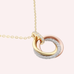Pre-Owned Trinity Pendant Necklace, Small Model, Half-Paved, 18K White, Yellow & Rose Gold - Image 2