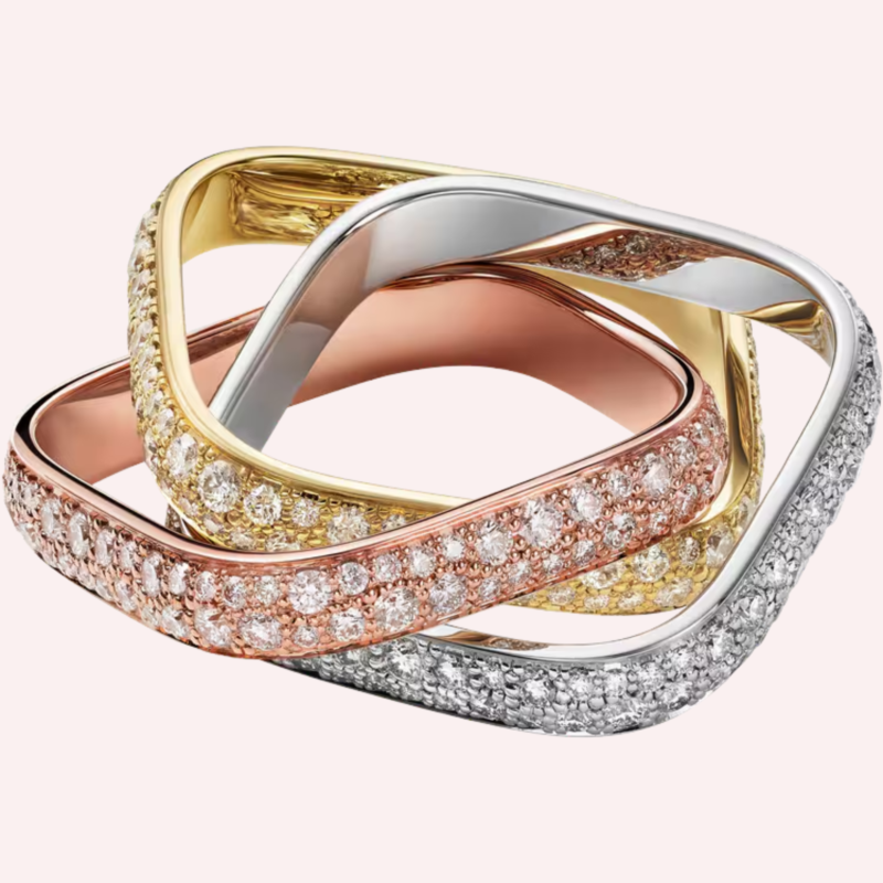 A Pre-Owned Cartier Trinity ring in white, rose, and yellow gold