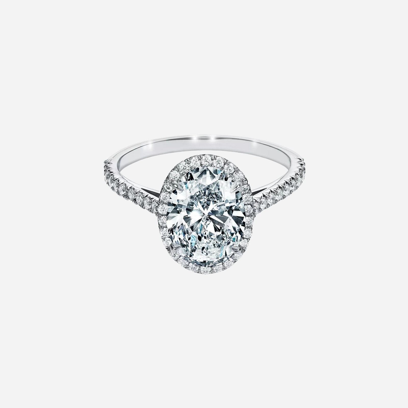 Pre-Owned Tiffany Soleste® Oval Halo Engagement Ring with a Diamond Platinum Band (2) Pre-Owned Tiffany Soleste® Oval Halo Engagement Ring with a Diamond Platinum Band